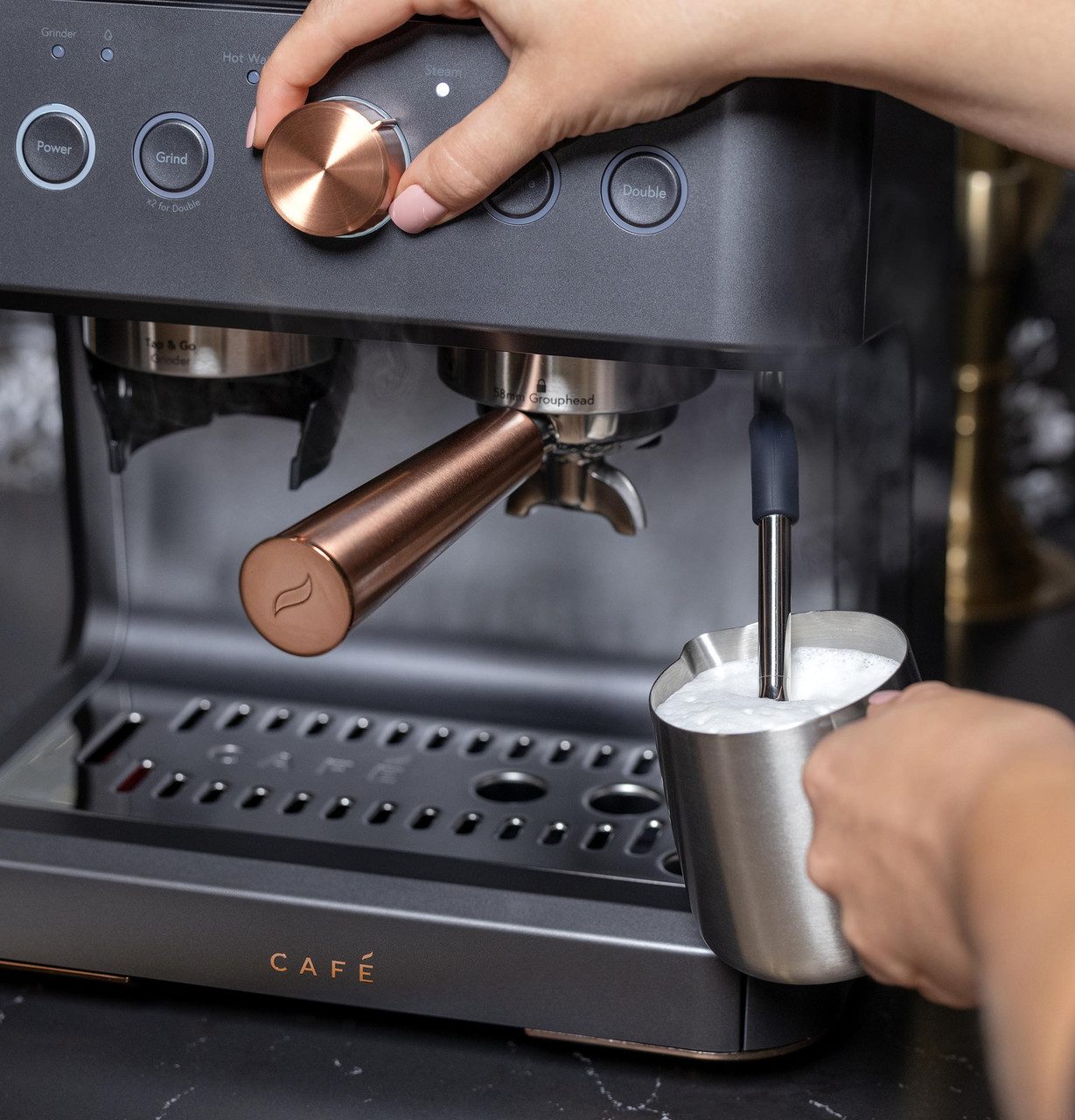 A steam wand that swings 180 degrees