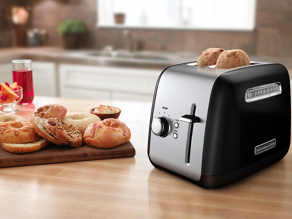 KitchenAid 2-slice manual-lift toaster in a kitchen