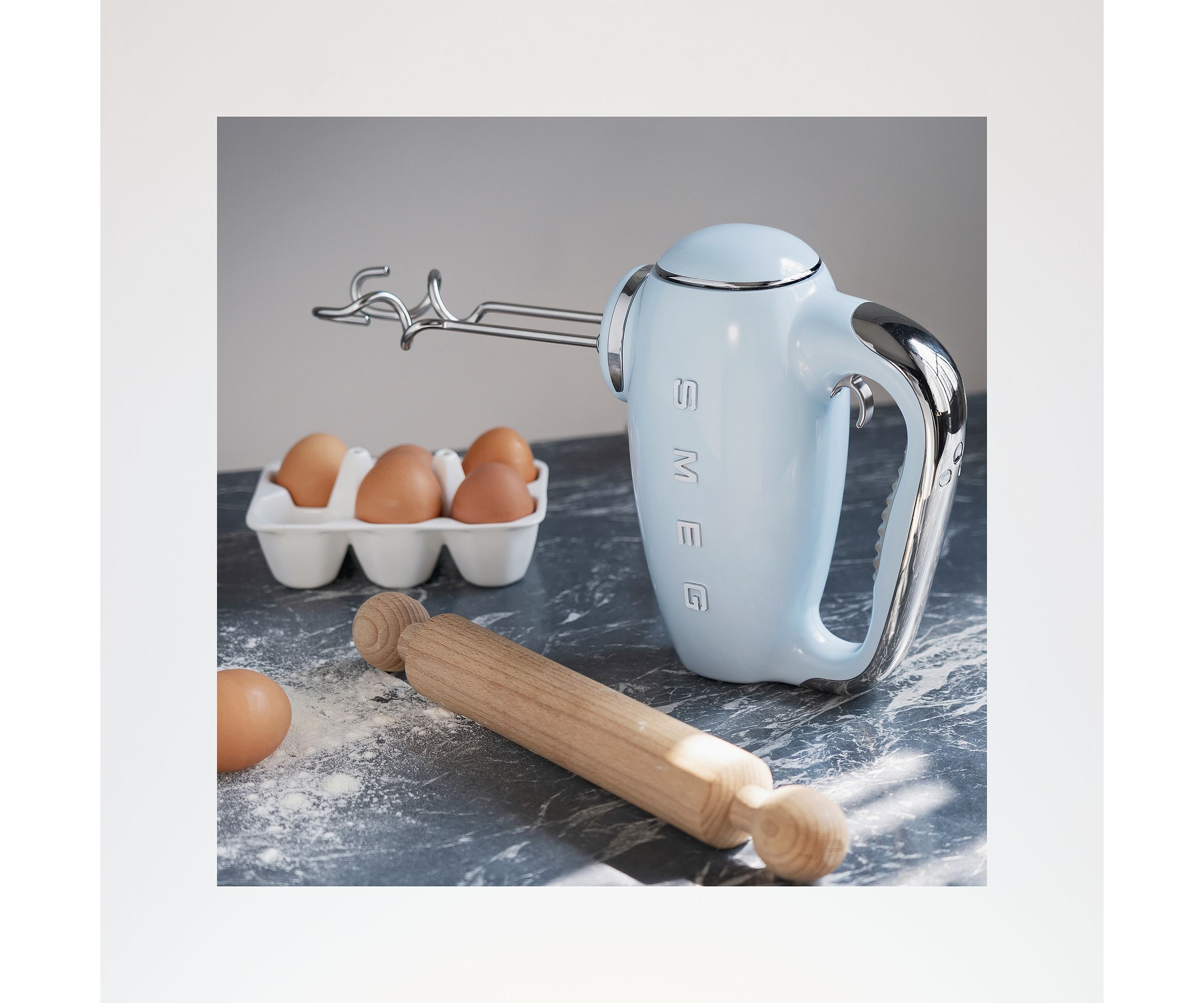 Smeg HMF01 hand mixer in a kitchen